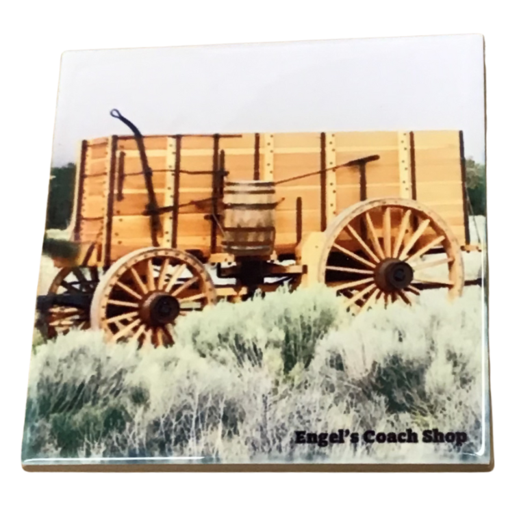 Wagon with large wheels on a ceramic tile, featuring 'Engel's Coach Shop' branding.