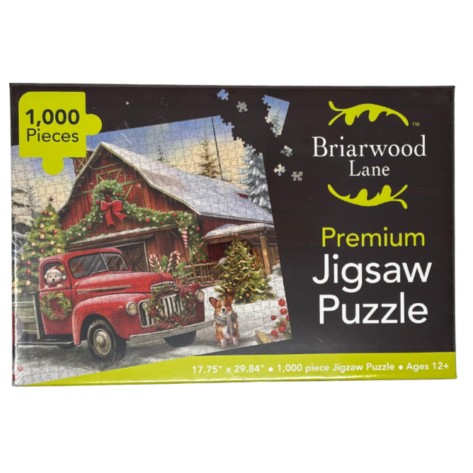 Jigsaw puzzle packaging with a red truck and cabin design, featuring Briarwood Lane branding.
