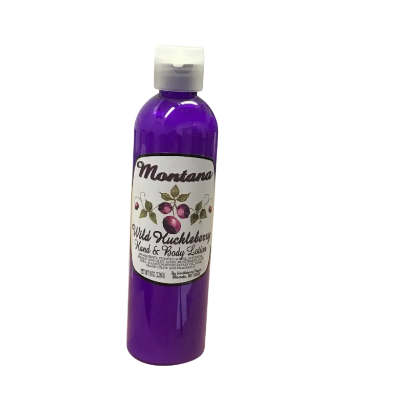 Purple bottle of Montana Wild Huckleberry lotion on a white background