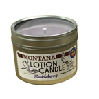 Montana Lotion Candle with Huckleberry scent in a metal tin on a white background